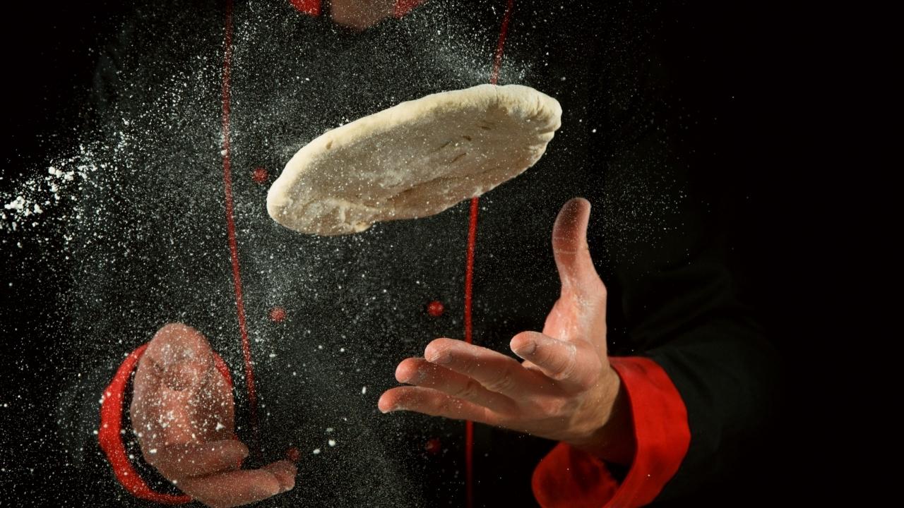 The Neapolitan Slapping Technique To Stretch Pizza Dough